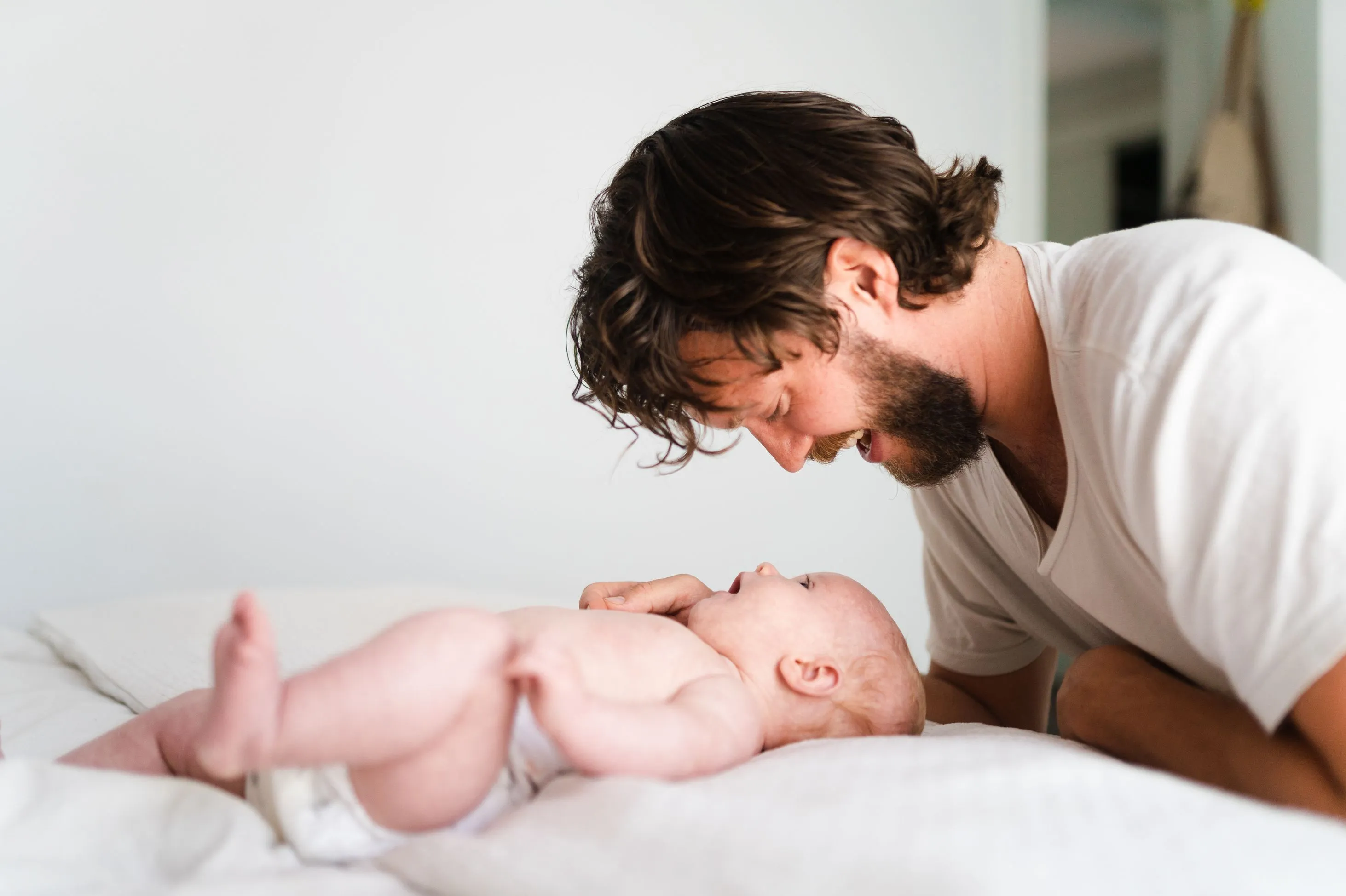 Father bonding with infant